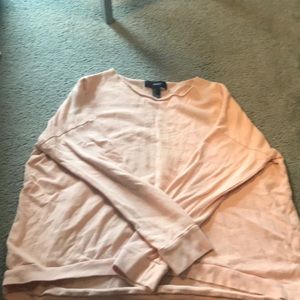 Long sleeve shirt. Is longer in the back.